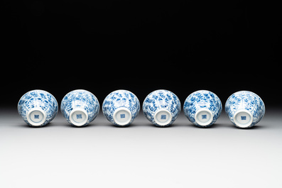 Six Chinese blue and white cups and saucers with floral design, Kangxi