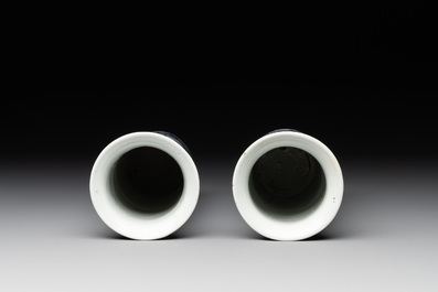 A pair of Chinese blue and white 'gu' vases, three jars, a plate and a plaque, Kangxi mark, 19th C.