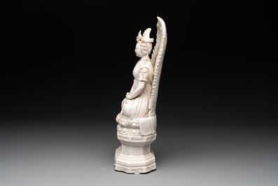 A Chinese Dehua blanc de Chine seated Guanyin, Qianlong mark, Republic