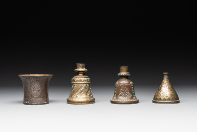 A bidriware vase, a steel hookah cup and three copper alloy hookah mounts, India/Persia, 19th C.