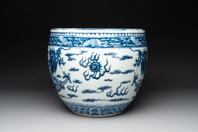 A Chinese blue and white 'dragon' fish bowl, 19th C.