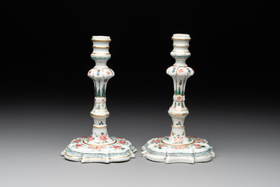 A pair of rare Chinese export famille rose candlesticks with floral design, Yongzheng/Qianlong