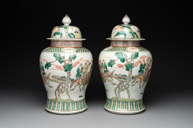 A pair of famille verte-style 'warriors on horseback' vases and covers, Samson, Paris, 19th C.