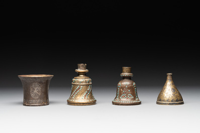 A bidriware vase, a steel hookah cup and three copper alloy hookah mounts, India/Persia, 19th C.