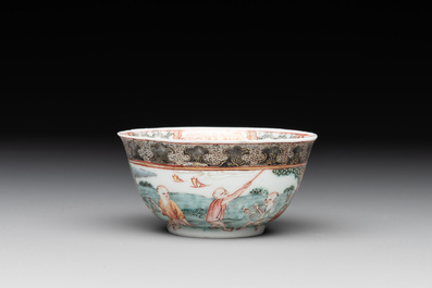 A fine Chinese famille rose 'apple pickers' cup and saucer, Yongzheng