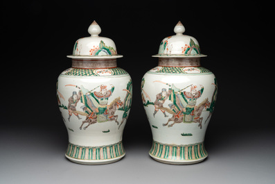 A pair of famille verte-style 'warriors on horseback' vases and covers, Samson, Paris, 19th C.