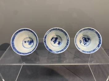Six Chinese blue and white cups and saucers with floral design, Kangxi