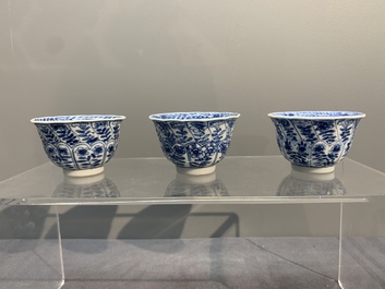 Six Chinese blue and white cups and saucers with floral design, Kangxi