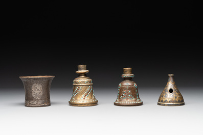 A bidriware vase, a steel hookah cup and three copper alloy hookah mounts, India/Persia, 19th C.