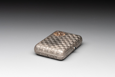 A rare Russian Faberg&eacute; bejewelled gold and silver cigarette presentation case, marked Mikhail Perkhin (1860-1903)