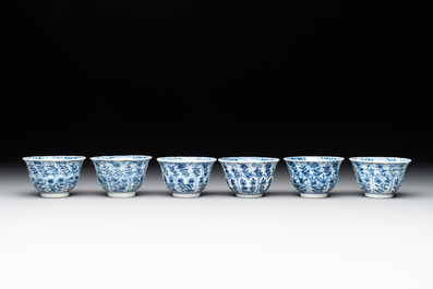 Six Chinese blue and white cups and saucers with floral design, Kangxi