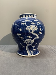 A pair of Chinese blue and white 'gu' vases, three jars, a plate and a plaque, Kangxi mark, 19th C.