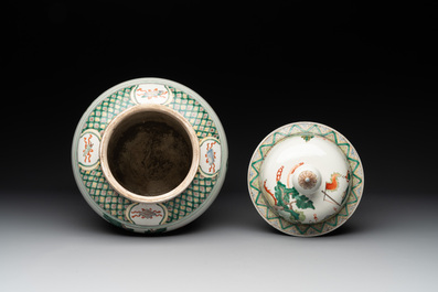 A pair of famille verte-style 'warriors on horseback' vases and covers, Samson, Paris, 19th C.