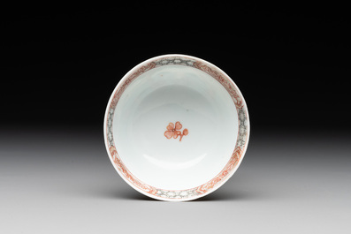 A fine Chinese famille rose 'apple pickers' cup and saucer, Yongzheng