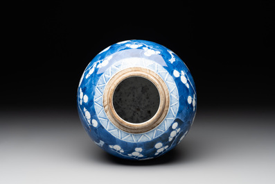 A pair of Chinese blue and white 'gu' vases, three jars, a plate and a plaque, Kangxi mark, 19th C.