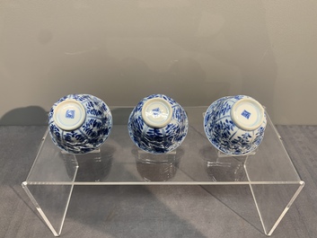 Six Chinese blue and white cups and saucers with floral design, Kangxi