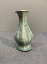 A Chinese Longquan celadon lobed bottle vase, Song