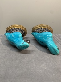 A pair of turquoise- and aubergine-glazed parrots with gilt bronze mounts, Kangxi