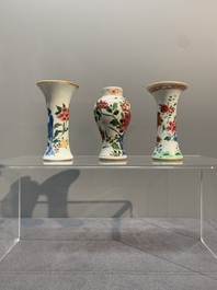 A Chinese famille rose tea caddy, two covered milk jugs and three vases, Yongzheng/Qianlong