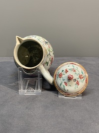 A Chinese famille rose tea caddy, two covered milk jugs and three vases, Yongzheng/Qianlong
