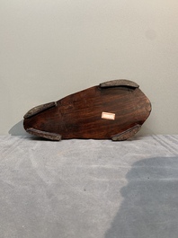 A Chinese wucai Lingbi stone scholar's rock on wooden stand, 20th C.