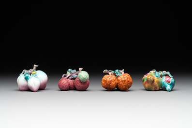 A collection of 12 Chinese famille rose fruit models, including a peach-shaped box and cover, 19th C.