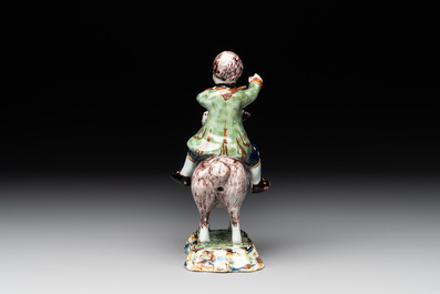 A polychrome Dutch Delft model of a buckrider, 18th C.