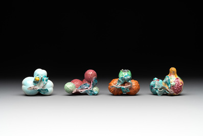 A collection of 12 Chinese famille rose fruit models, including a peach-shaped box and cover, 19th C.