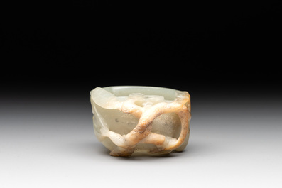 A Chinese jade peach-shaped brush washer on wooden stand, 19th C.