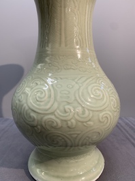 A Chinese incised celadon-glazed 'chilong' vase, Kangxi