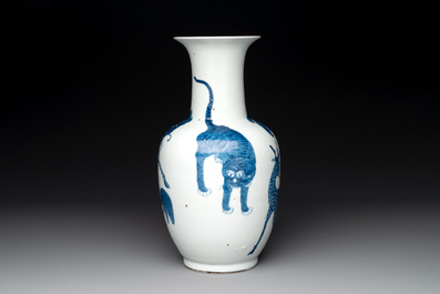 A Chinese blue and white 'mythical animals' vase, Kangxi mark, 19/20th C.
