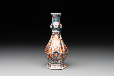 A polychrome Dutch Delft petit feu vase, 18th C.