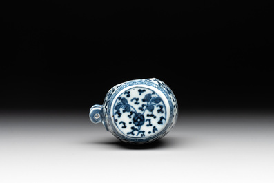 A Chinese blue and white tea caddy with wooden cover and a bird feeder, Xuande mark, 19th C.