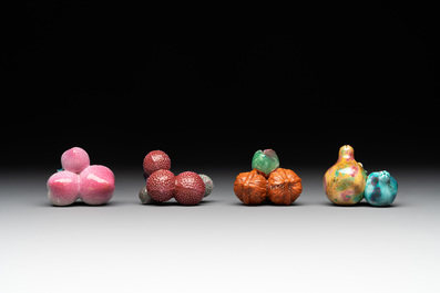 A collection of 12 Chinese famille rose fruit models, including a peach-shaped box and cover, 19th C.