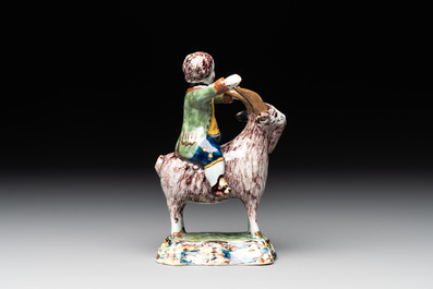 A polychrome Dutch Delft model of a buckrider, 18th C.