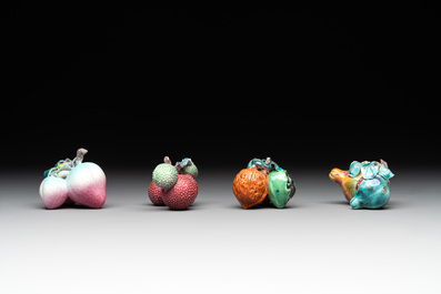 A collection of 12 Chinese famille rose fruit models, including a peach-shaped box and cover, 19th C.