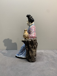 A Chinese famille rose lady and a Buddha, 19/20th C.