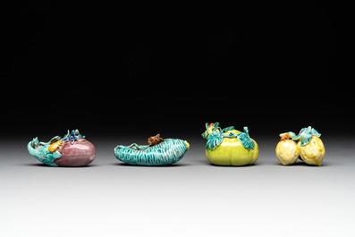 A collection of 12 Chinese famille rose fruit models, including a peach-shaped box and cover, 19th C.