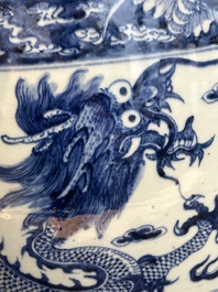 A Chinese blue and white 'dragon' fish bowl, 19th C.