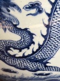 A Chinese blue and white 'dragon' fish bowl, 19th C.