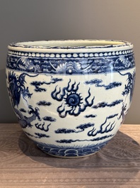 A Chinese blue and white 'dragon' fish bowl, 19th C.