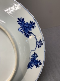 A Chinese blue and white dish with floral design, Kangxi mark and of the period