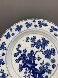 A Chinese blue and white dish with floral design, Kangxi mark and of the period