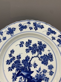 A Chinese blue and white dish with floral design, Kangxi mark and of the period