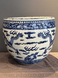 A Chinese blue and white 'dragon' fish bowl, 19th C.