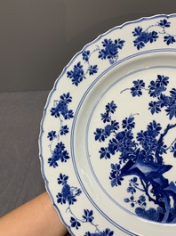 A Chinese blue and white dish with floral design, Kangxi mark and of the period