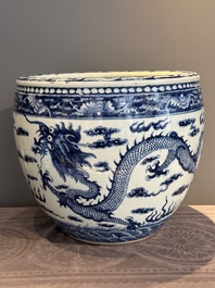 A Chinese blue and white 'dragon' fish bowl, 19th C.