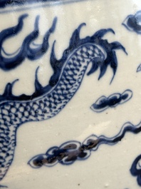A Chinese blue and white 'dragon' fish bowl, 19th C.