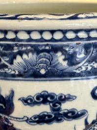 A Chinese blue and white 'dragon' fish bowl, 19th C.