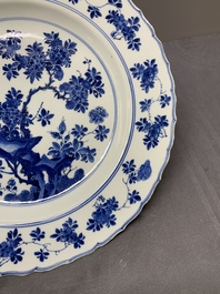 A Chinese blue and white dish with floral design, Kangxi mark and of the period